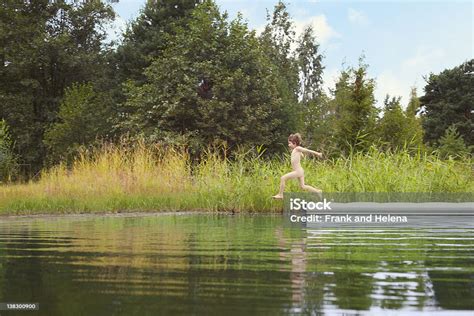 swimming nude|Naked in nature